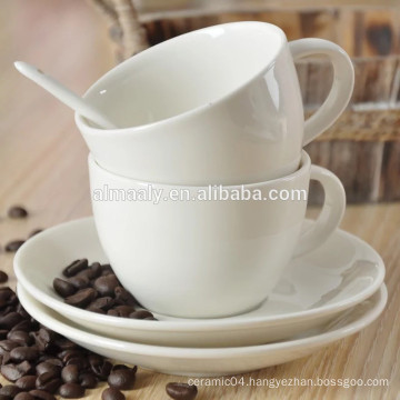 white ceramic cup and saucer